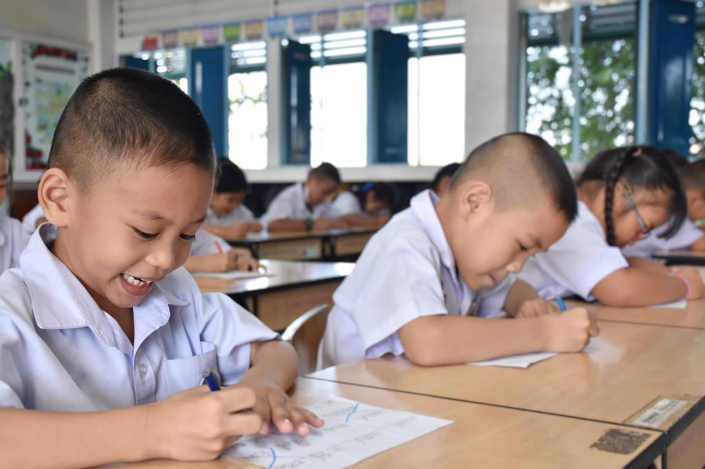 Pupils play games to promote Thai language skills in the classroom in Bangkok. Thailand in 2025 banned all types of violent or corporal punishment in homes, schools and other facilities. Photo: Shutterstock