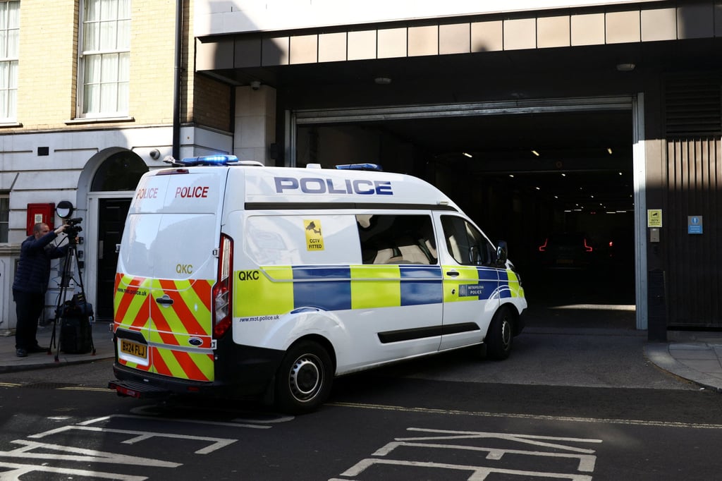 A van arrives at London’s Westminster Magistrates Court on Friday. Photo: Reuters