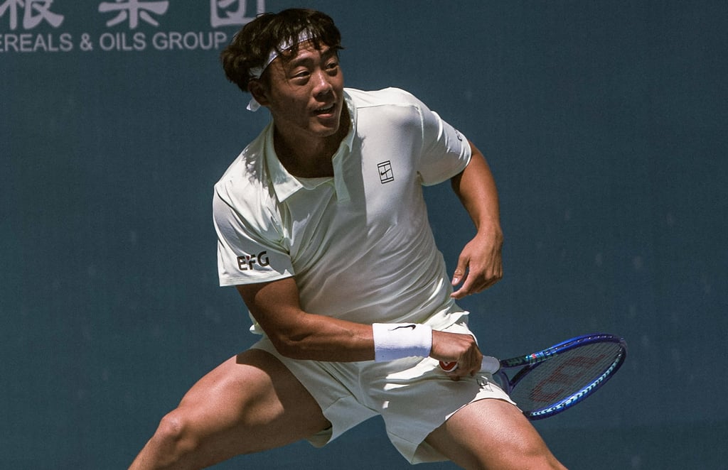 Coleman Wong, here in action against Bu Yunchaokete, is into the Jiujiang final without dropping a set. Photo: Weibo Coleman Wong, here in action against Bu Yunchaokete, is into the Jiujiang final without dropping a set. Photo: Weibo