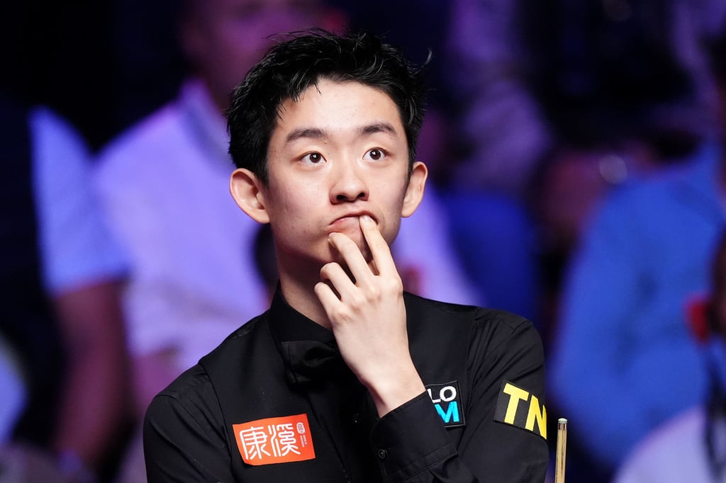 Wu Yize has time to think during his cat-and-mouse World Championship clash with Mark Allen. Photo: AP Wu Yize has time to think during his cat-and-mouse World Championship clash with Mark Allen. Photo: AP