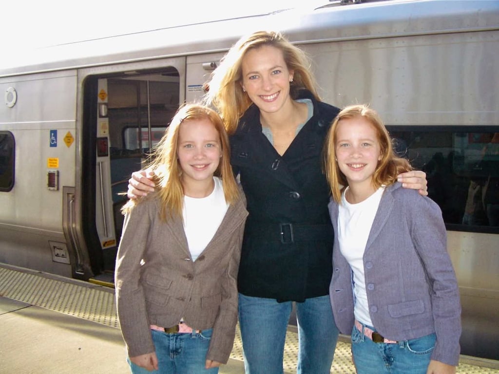 Lauren Weisberger in 2005 with the actresses who played Caroline and Cassidy, Miranda Priestly’s twin daughters. Photo: @laurenweisberger/Instagram