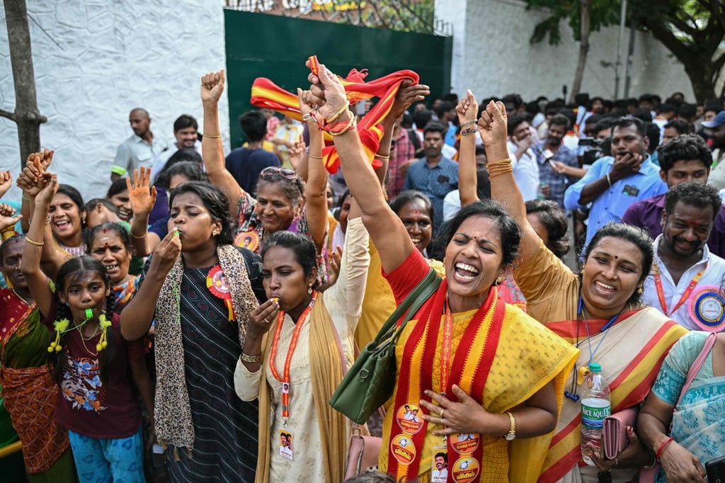 Supporters and members of Indian actor Joseph Vijay’s Tamilaga Vettri Kazhagam (TVK) party celebrate after TVK leads in the vote counting for the Tamil Nadu Legislative Assembly elections in Chennai on Monday. Photo: AFP