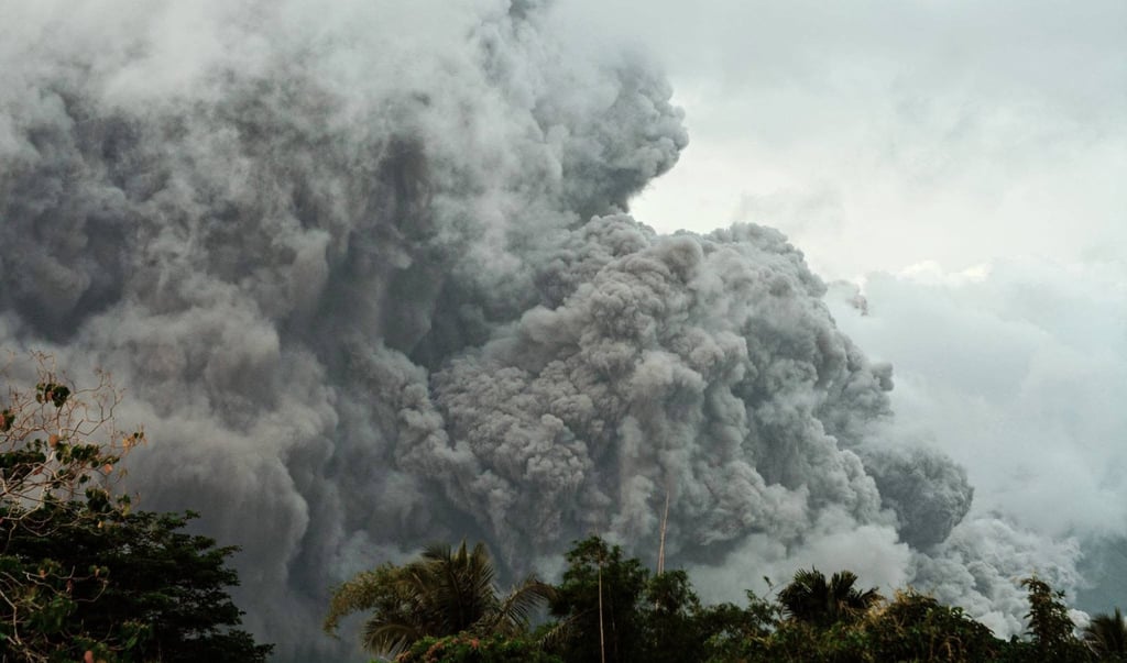 Thick clouds of ash from Mayon are seen from Daraga, Albay province, Philippines on Saturday. Photo: AP