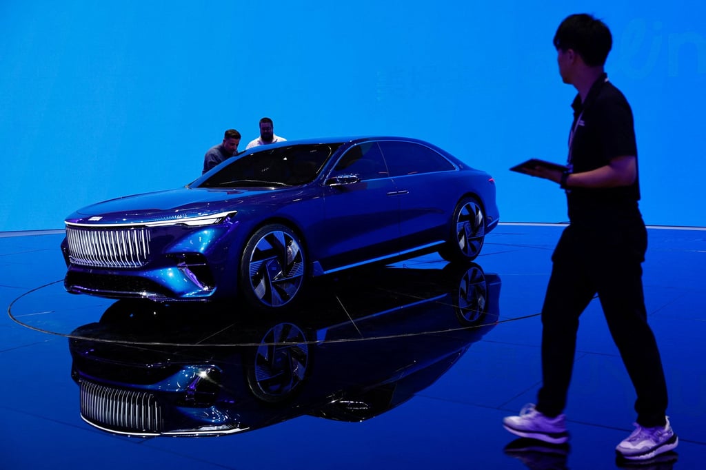 Visitors check out the Geely Galaxy Light second-generation concept car at the Beijing auto show. Photo: Reuters