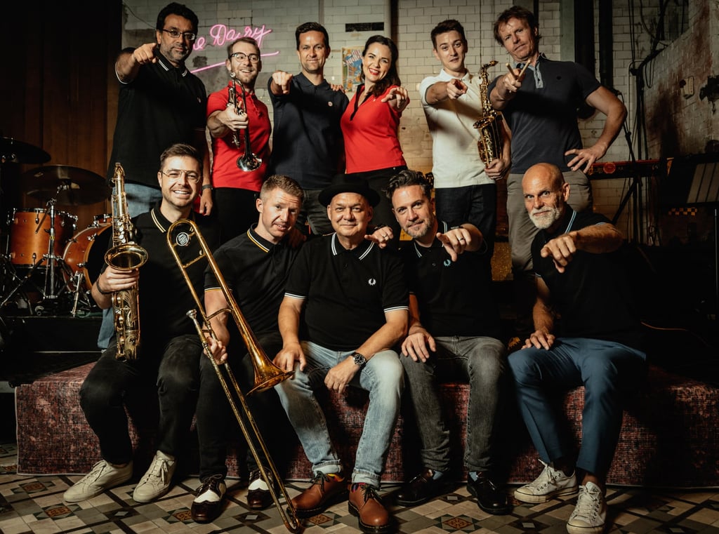 Thompson (bottom row, second from right) sits with other members of The Red Stripes. The ska band will perform at the Hong Kong International Reggae Ska Festival 2026. Photo: courtesy of Hong Kong International Reggae Ska Festival