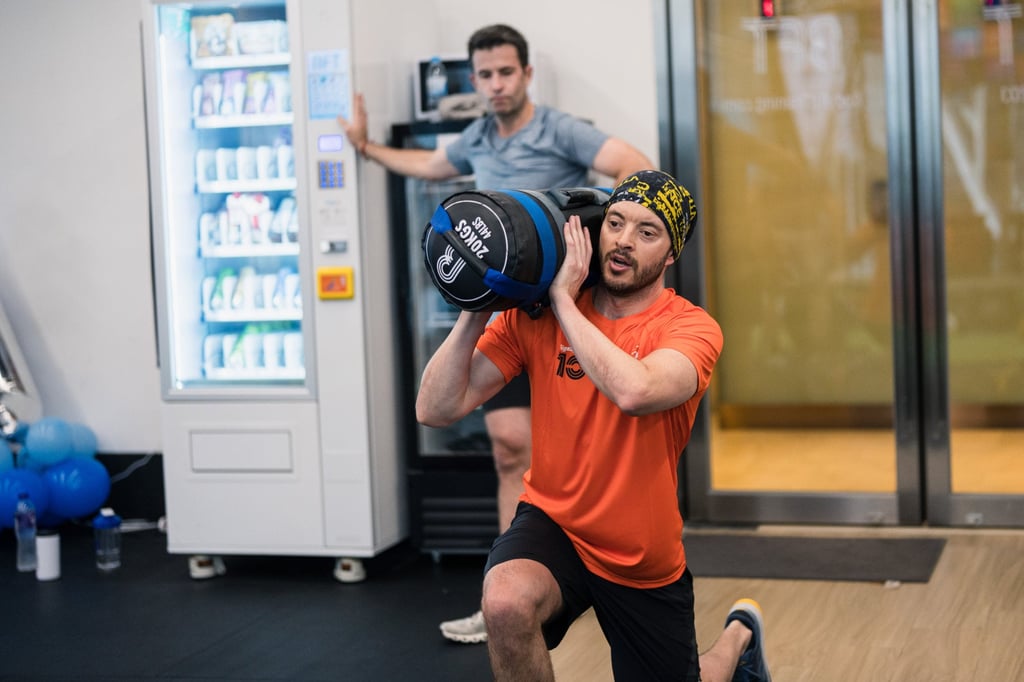 A Hyrox trainer practising weighted lunges at BFT Fitness. Photo: Handout A Hyrox trainer practising weighted lunges at BFT Fitness. Photo: Handout