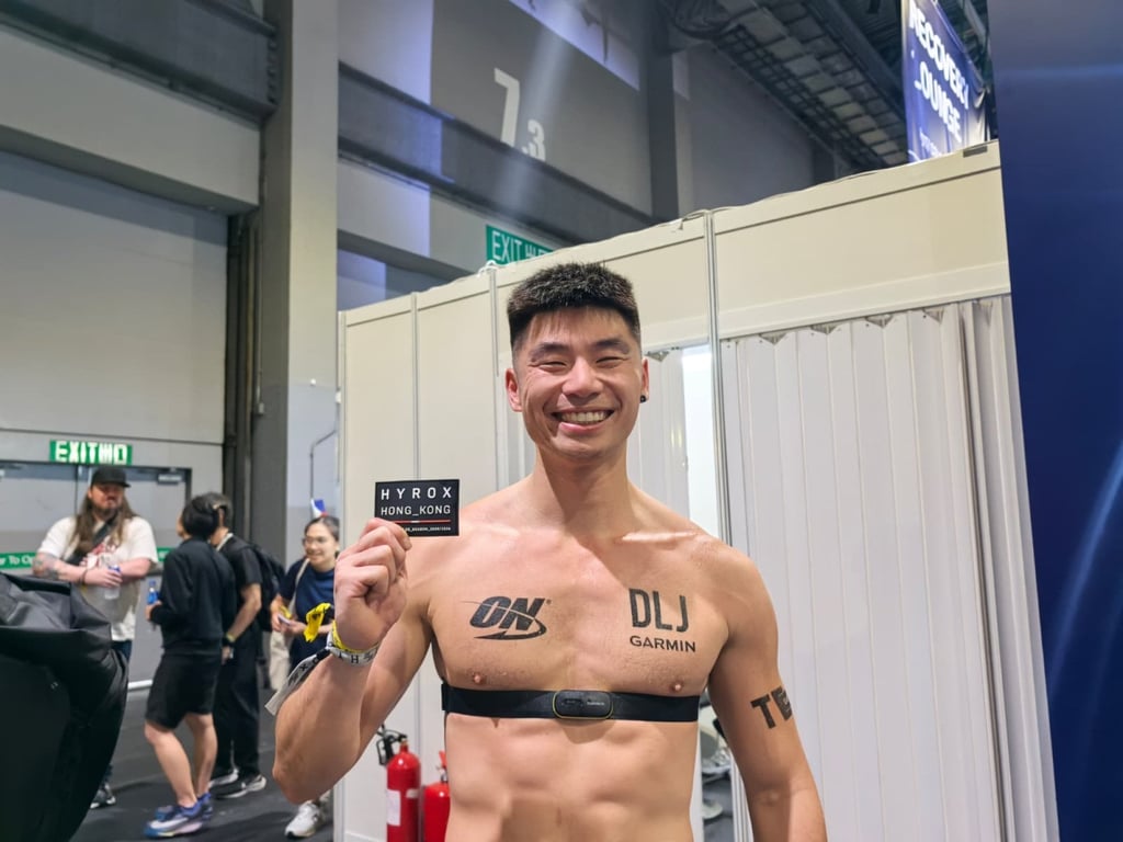 Fitness trainer Clayton Law after finishing the first of his eight races. Photo: Ada Li