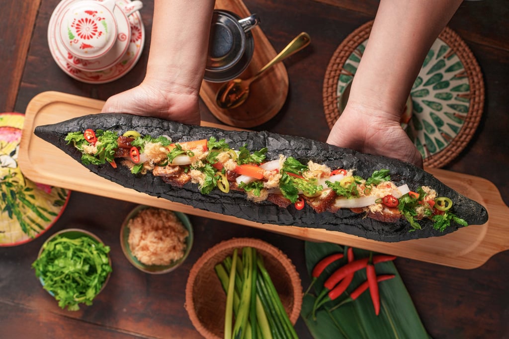 Bistro Hoi An’s 20-inch bamboo charcoal banh mi is limited to 20 a day. Photo: Handout