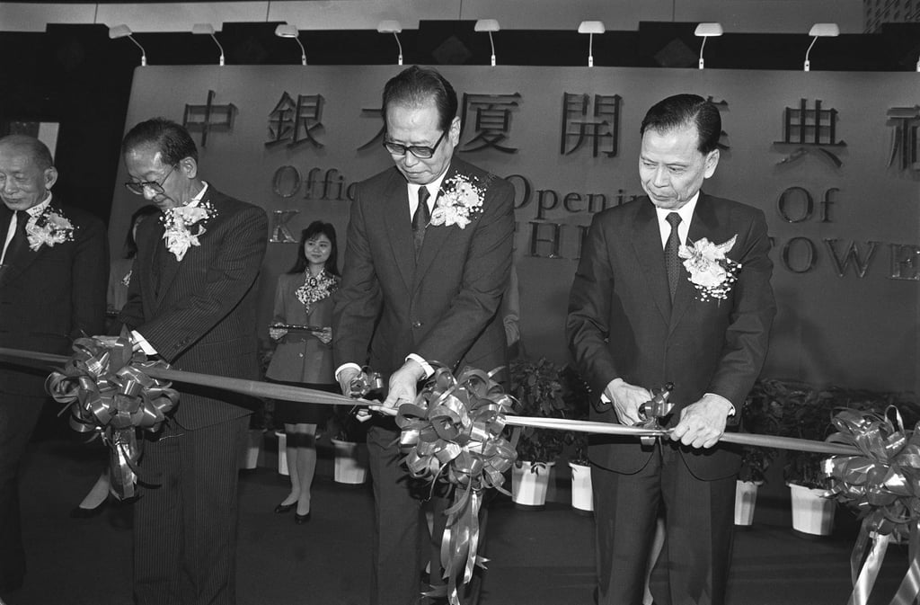 Mr Wang Deyan (second from left), President of the Bank of China, and Mr Zhou Nan (centre), Director of the New China News Agency, perform the ribbon-cutting ceremony which marks the opening of the Bank of China Tower in 1990. Photo: SCMP
