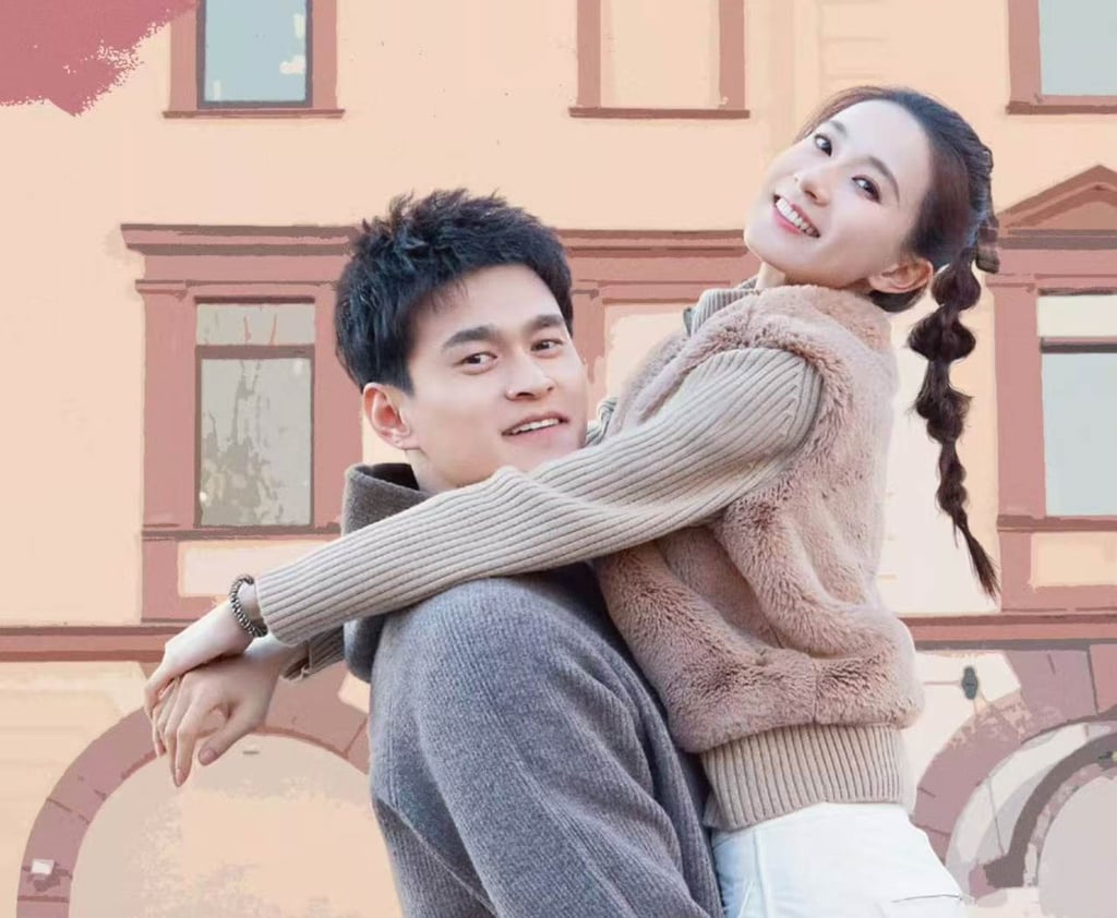 Sun Yang and his wife Zhang Doudou, a former rhythmic gymnast, on a promotional poster for the travel variety show Viva La Romance. Photo: Weibo Sun Yang and his wife Zhang Doudou, a former rhythmic gymnast, on a promotional poster for the travel variety show Viva La Romance. Photo: Weibo
