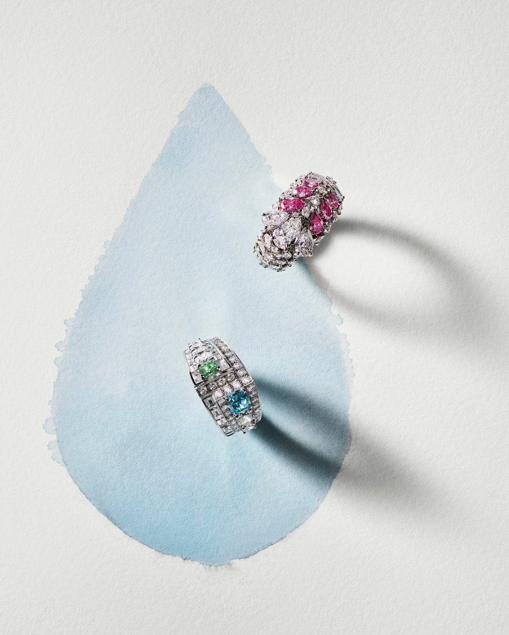The Kinko ring and Auralis ring feature rare blue, green and pink diamonds. Photo: Handout The Kinko ring and Auralis ring feature rare blue, green and pink diamonds. Photo: Handout