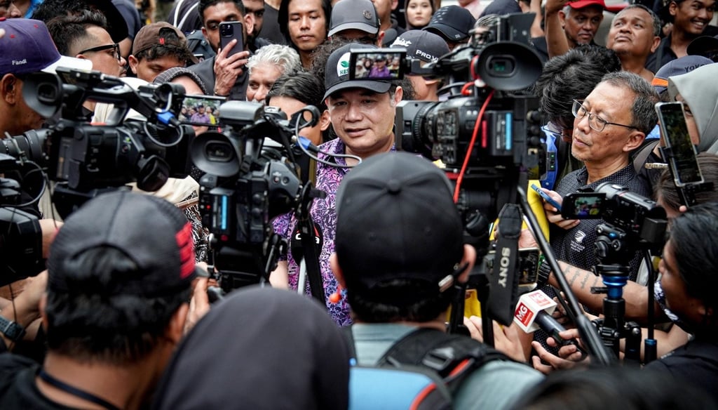 Rafizi Ramli (centre) speaks to reporters during a protest on April 25. Photo: Facebook/Rafizi Ramli