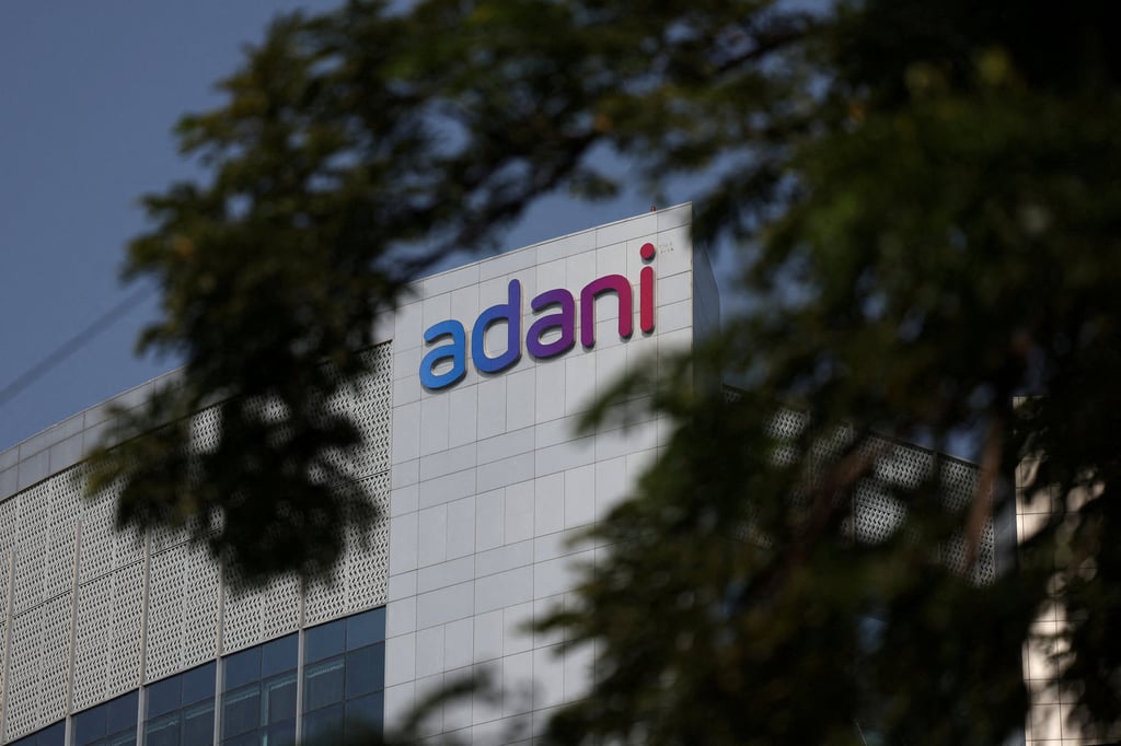 The logo of the Adani Group is seen on a building on the outskirts of Ahmedabad, India, in November 2024. Photo: Reuters
