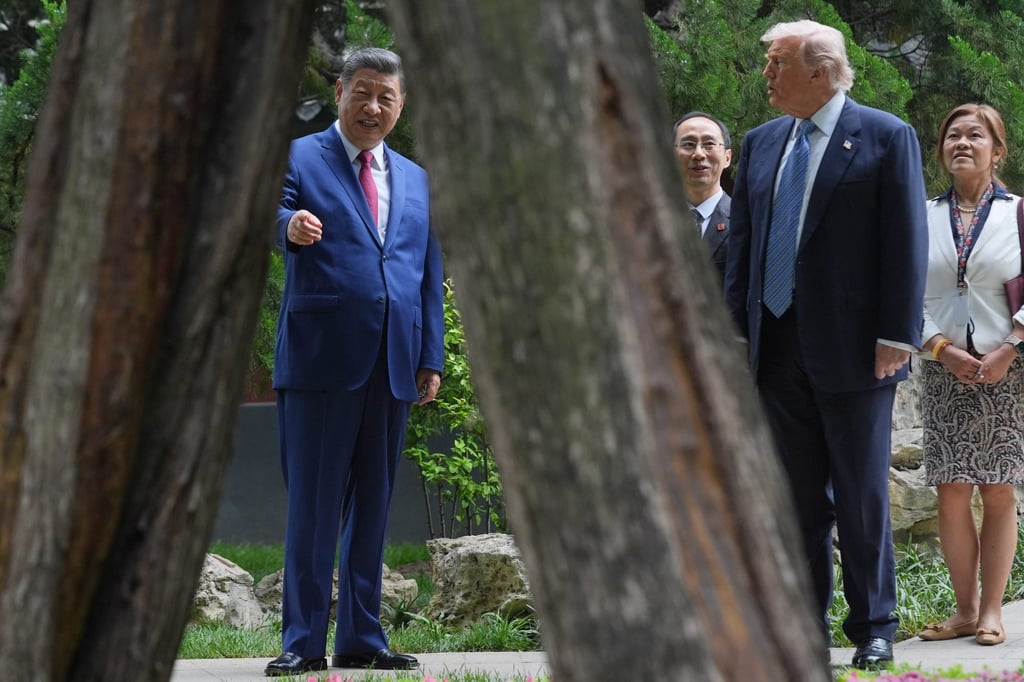 Xi and Trump discuss the ancient trees at Zhongnanhai. Photo: AP