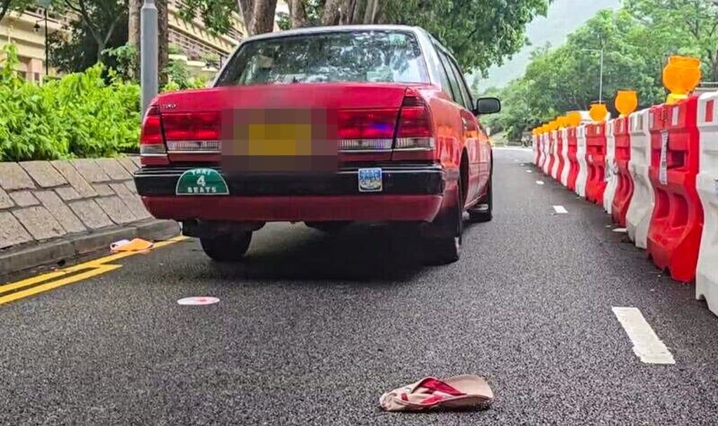 The cabby was arrested after his vehicle collided with the pedestrian. Photo: Cable TV News The cabby was arrested after his vehicle collided with the pedestrian. Photo: Cable TV News