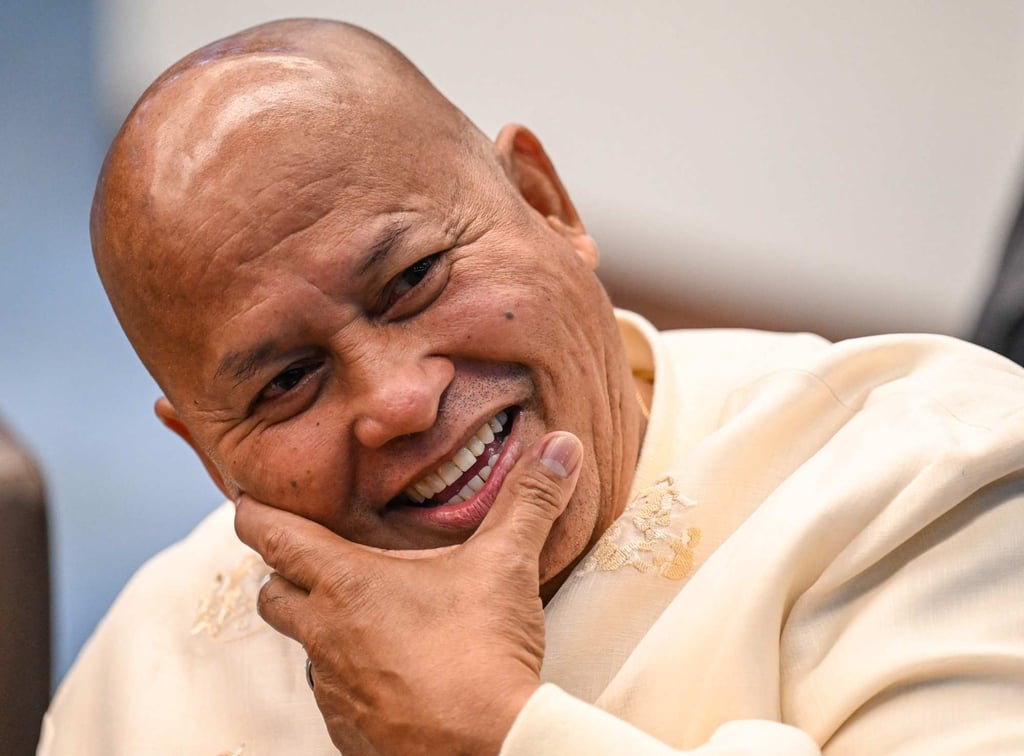 Philippine Senator Ronald Dela Rosa talks to the media before the start of a plenary session at the Senate on Tuesday. Photo: AFP