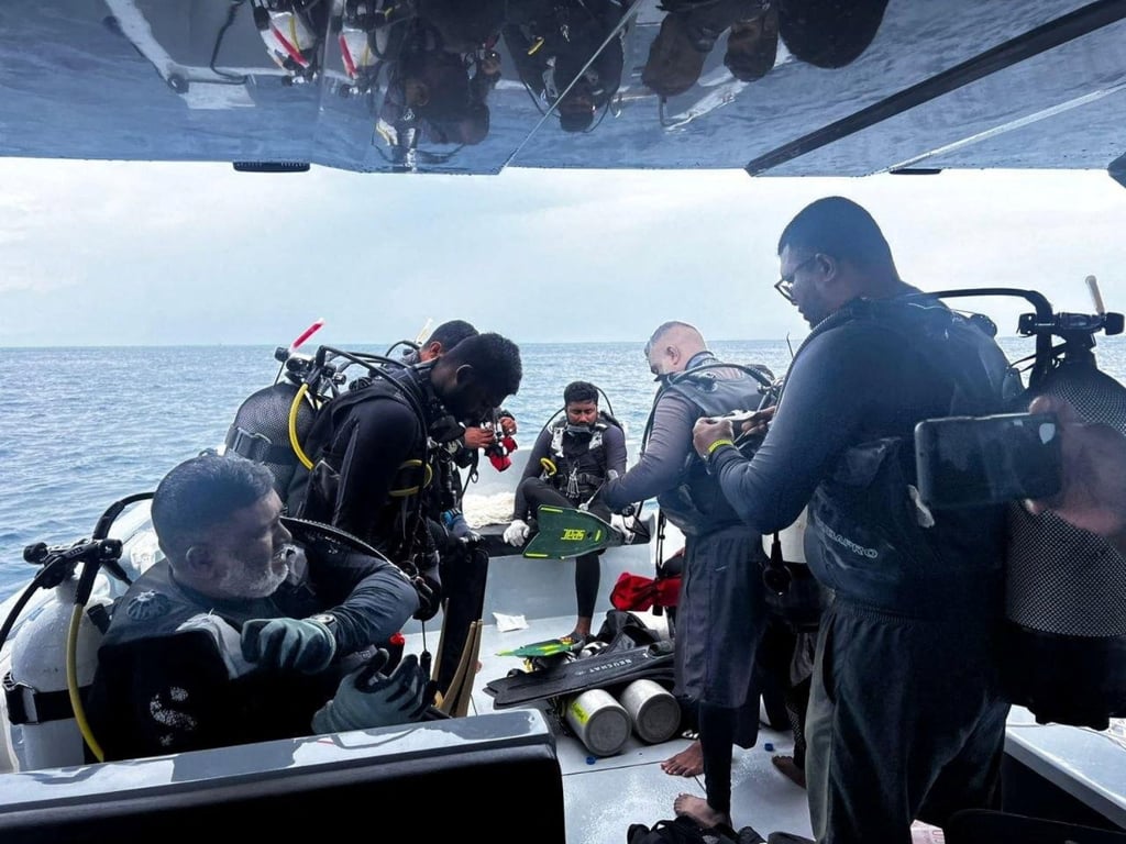 Members of Maldives’ National Defence Force prepare to take part in a search and recovery operation for four Italian scuba divers in the waters off Vaavu Atoll on Saturday. Photo: Maldives President’s Office/Reuters Members of Maldives’ National Defence Force prepare to take part in a search and recovery operation for four Italian scuba divers in the waters off Vaavu Atoll on Saturday. Photo: Maldives President’s Office/Reuters