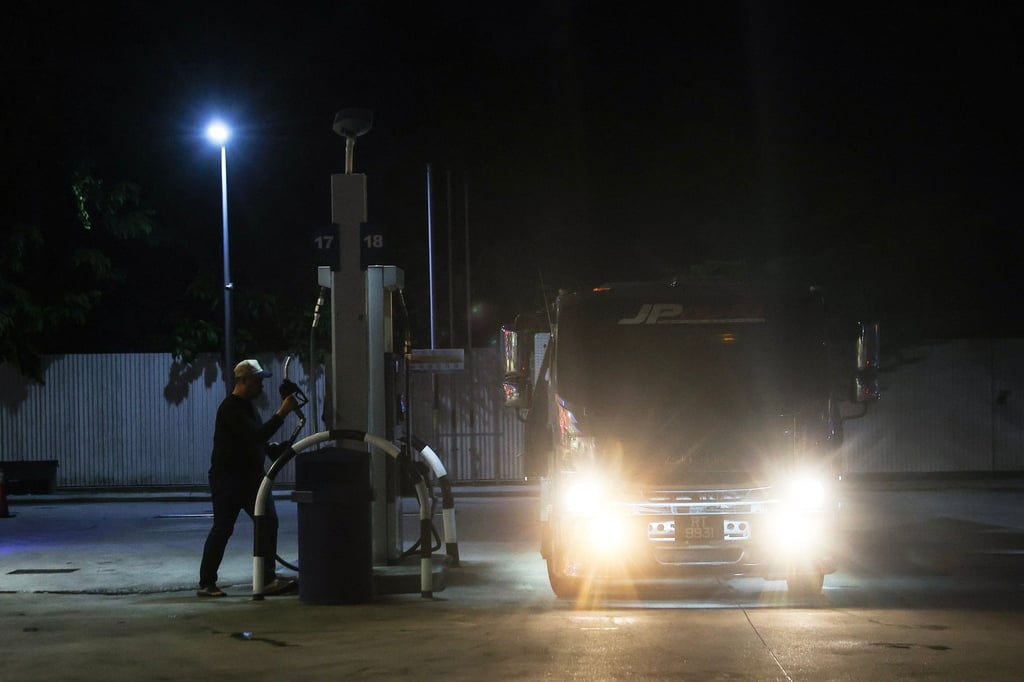 A man goes to fill a lorry with diesel at a petrol station in Shah Alam, Malaysia, earlier this month. Photo: EPA A man goes to fill a lorry with diesel at a petrol station in Shah Alam, Malaysia, earlier this month. Photo: EPA