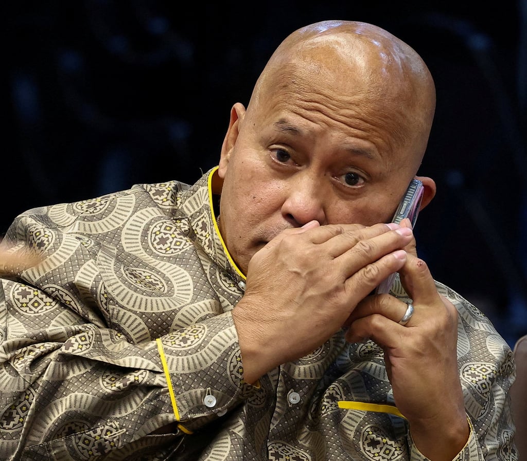 Philippine Senator Ronald dela Rosa takes a phone call during a session at the Senate on Wednesday. Photo: Reuters