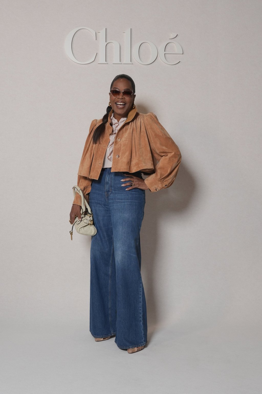 Oprah Winfrey toted a Chloé Paddington bag at the brand’s Paris Fashion Week show. Photo: Chloé Oprah Winfrey toted a Chloé Paddington bag at the brand’s Paris Fashion Week show. Photo: Chloé