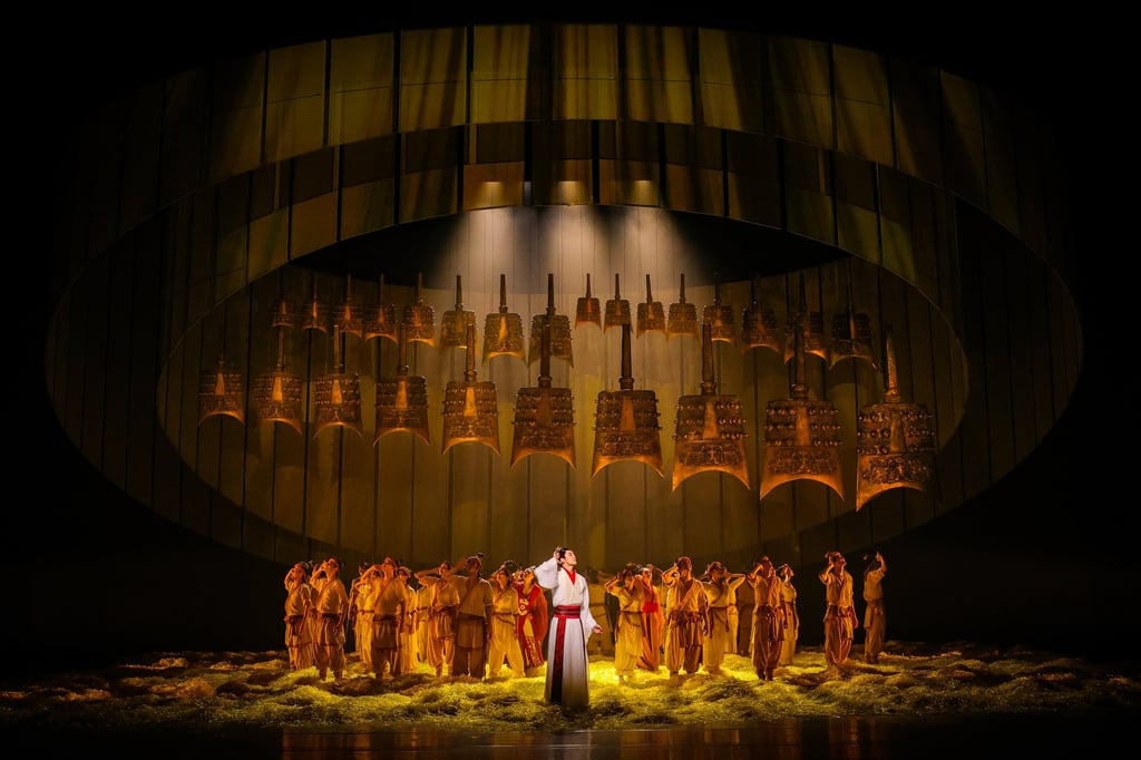 Life-sized replicas of ancient bronze chime bells dominate the stage of the dance drama Harmony in Eternal Melody, by Hubei Opera and Dance Drama Theater, which embodies the Chinese ideal that “music creates universal harmony”. Life-sized replicas of ancient bronze chime bells dominate the stage of the dance drama Harmony in Eternal Melody, by Hubei Opera and Dance Drama Theater, which embodies the Chinese ideal that “music creates universal harmony”.