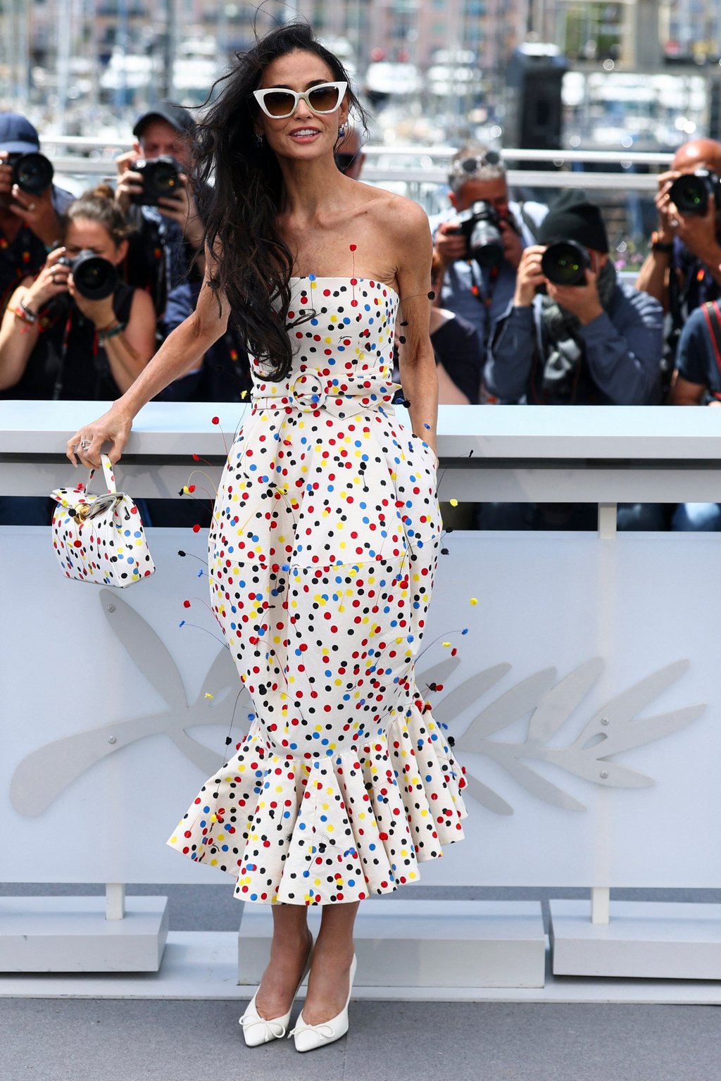 Demi Moore in a polka dot Jacquemus dress at the opening ceremony of the 79th Cannes Film Festival, on May 12. Photo: Reuters