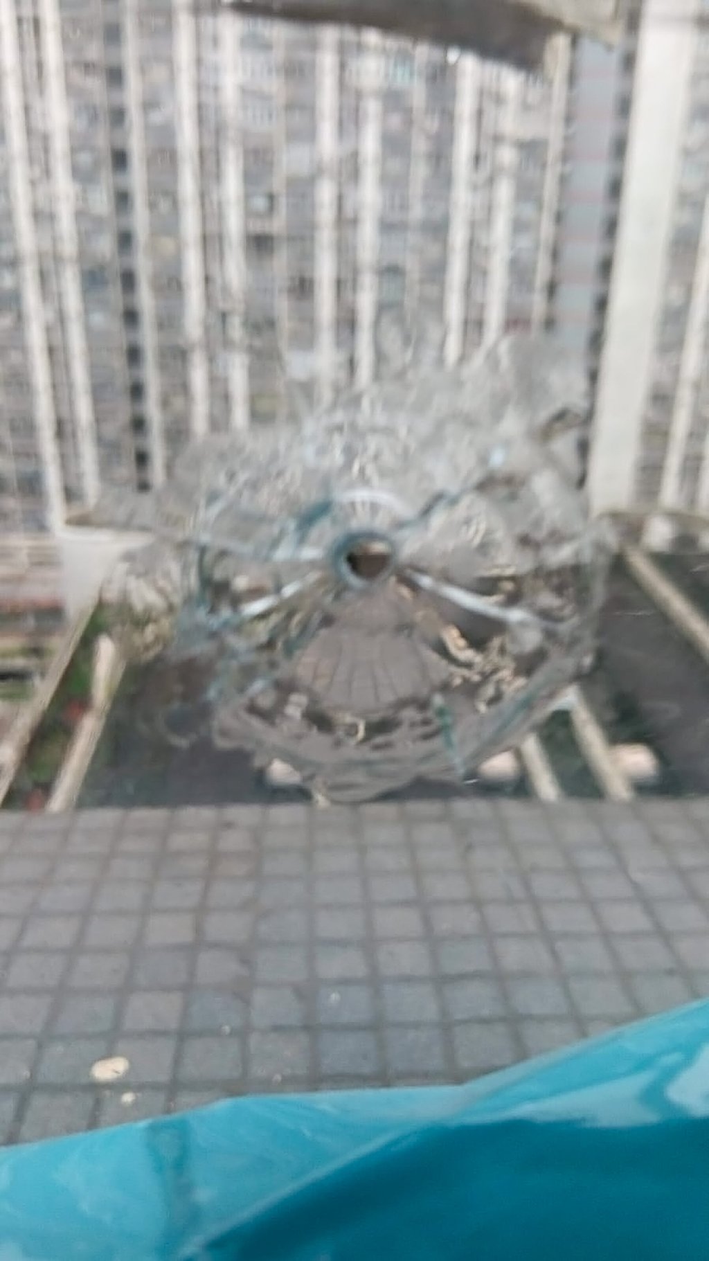 A social media post shows airgun damage to a window of a flat at Shek Ping House. Photo: Threads/@ritachong628 A social media post shows airgun damage to a window of a flat at Shek Ping House. Photo: Threads/@ritachong628