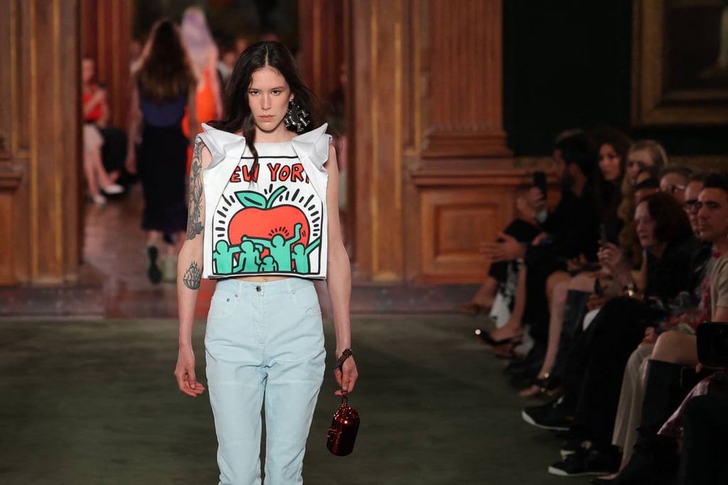 Keith Haring’s artwork on a top from the collection. Photo: AFP