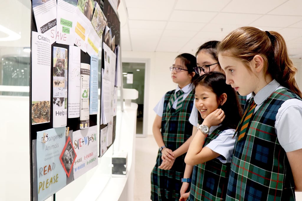 Students at Malvern College Hong Kong wear a distinctive tartan uniform. Photo: Handout Students at Malvern College Hong Kong wear a distinctive tartan uniform. Photo: Handout
