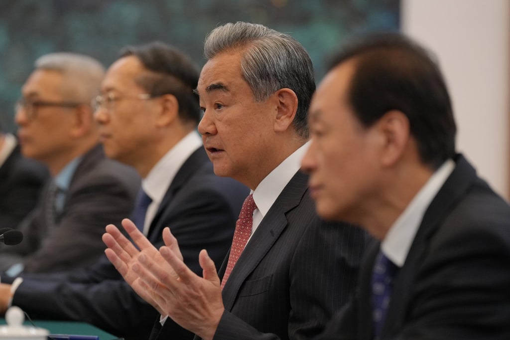 Chinese Foreign Minister Wang Yi (centre) speaks to a US congressional delegation during a bilateral meeting at the Great Hall of the People in Beijing on May 7. Photo: AP Chinese Foreign Minister Wang Yi (centre) speaks to a US congressional delegation during a bilateral meeting at the Great Hall of the People in Beijing on May 7. Photo: AP