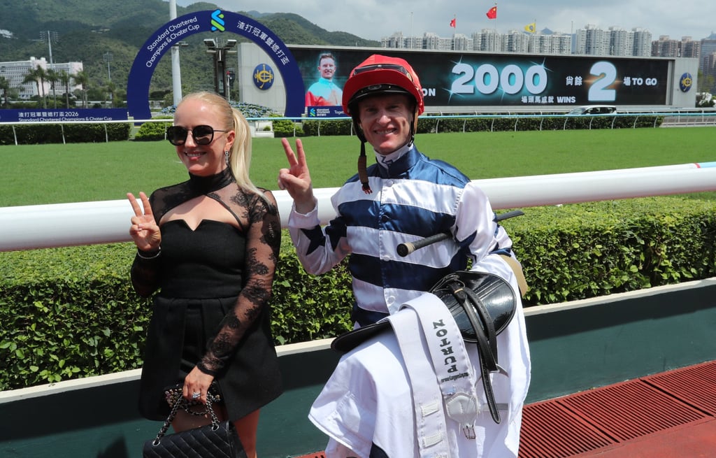 Zac Purton (right) and wife Nicole celebrate after his win on Packing King. Photo: Kenneth Chan. Zac Purton (right) and wife Nicole celebrate after his win on Packing King. Photo: Kenneth Chan.