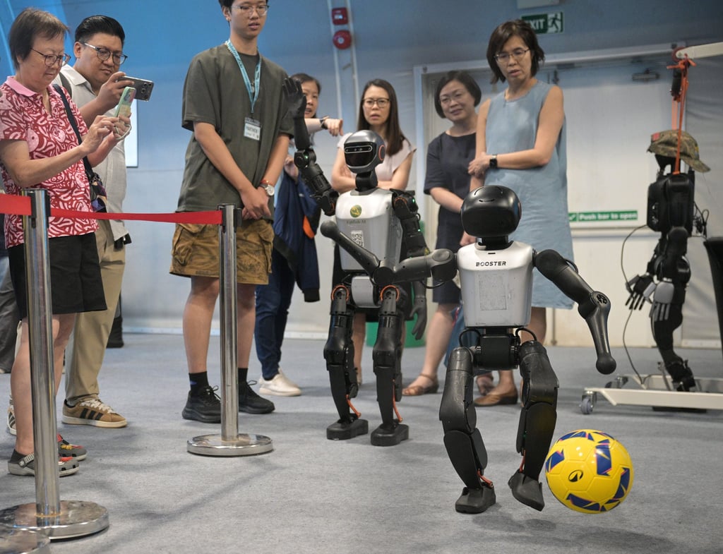 A robot plays football during the “RoboFest 2026: Meet Tomorrow, Today” at Science Centre Singapore on April 9. Photo: Xinhua