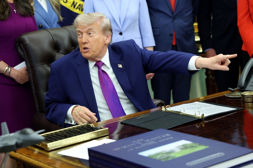 US President Donald Trump gestures to a member of the press during an event in the Oval Office on May 11. Photo: Getty Images/TNS