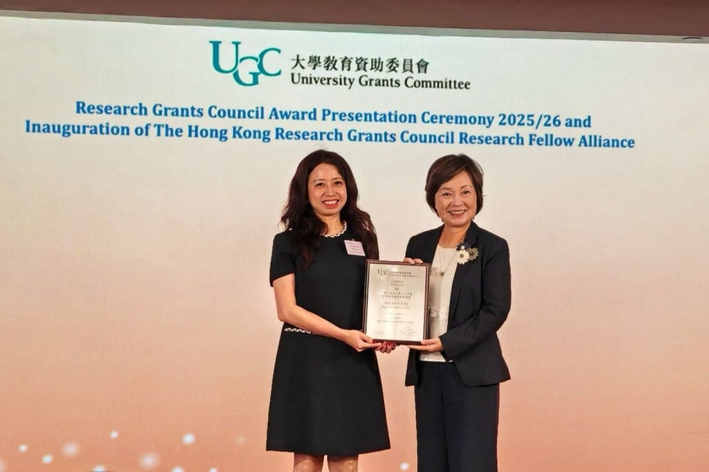 Professor Wang Jun (left) is presented with her RGC Senior Research Fellow certificate last year by Dr Choi Yuk-lin, Hong Kong’s Secretary for Education. Photo: Hong Kong Baptist University Professor Wang Jun (left) is presented with her RGC Senior Research Fellow certificate last year by Dr Choi Yuk-lin, Hong Kong’s Secretary for Education. Photo: Hong Kong Baptist University