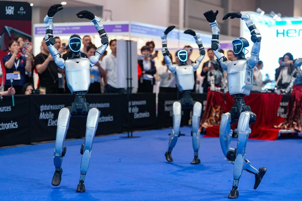 Unitree humanoid robots perform ballet dance moves at AsiaWorld-Expo in Hong Kong on April 18. Photo: Eugene Lee