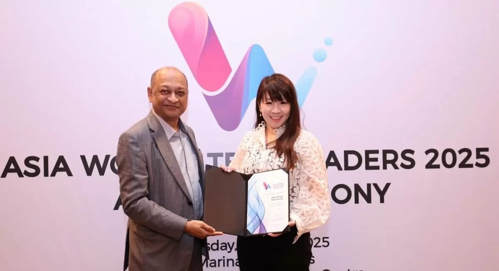 Sandeep Sakar (left), HCL Technologies’ senior vice-president, Asia-Pacific, presents Professor Christy Cheung with her award as one of the 50 most influential women in tech at the Asia Women Tech Leaders Award 2025 awards ceremony in Singapore. Photo: Hong Kong Baptist University Sandeep Sakar (left), HCL Technologies’ senior vice-president, Asia-Pacific, presents Professor Christy Cheung with her award as one of the 50 most influential women in tech at the Asia Women Tech Leaders Award 2025 awards ceremony in Singapore. Photo: Hong Kong Baptist University