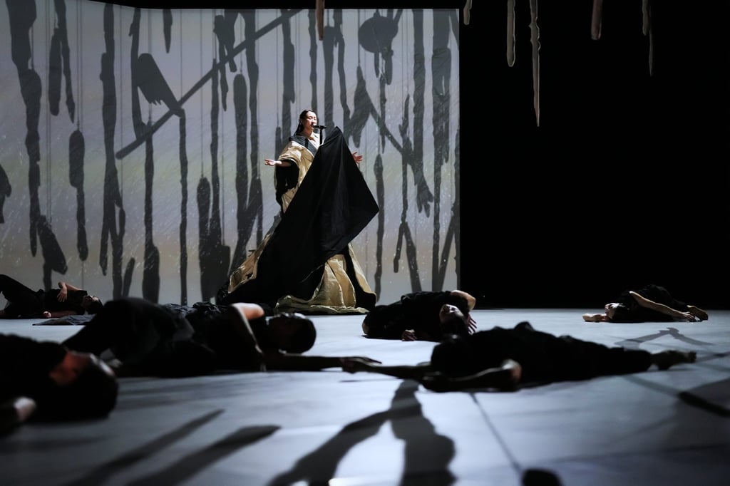 Ivana Wong sings on stage during a scene of In Between – Wu Guanzhong’s Ink Odyssey. Photo: S2 Production Ivana Wong sings on stage during a scene of In Between – Wu Guanzhong’s Ink Odyssey. Photo: S2 Production