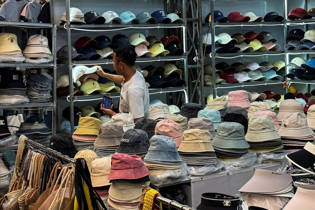 A man shops at Ninh Hiep market in Hanoi on Monday. Photo: Reuters