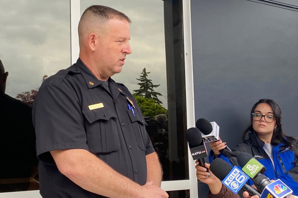 Cowlitz Fire and Rescue Chief Scott Goldstein speaks to reporters after a hazardous liquid implosion at the Nippon Dynawave Packaging on Tuesday. Photo: AP