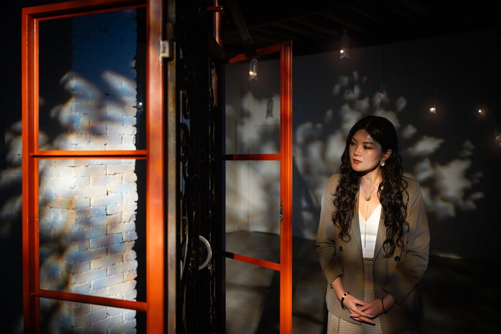 Angel Hui worked with Hong Kong metalsmiths to create a wrought-iron window frame for her installation, I Would Like to Open a Window for You.