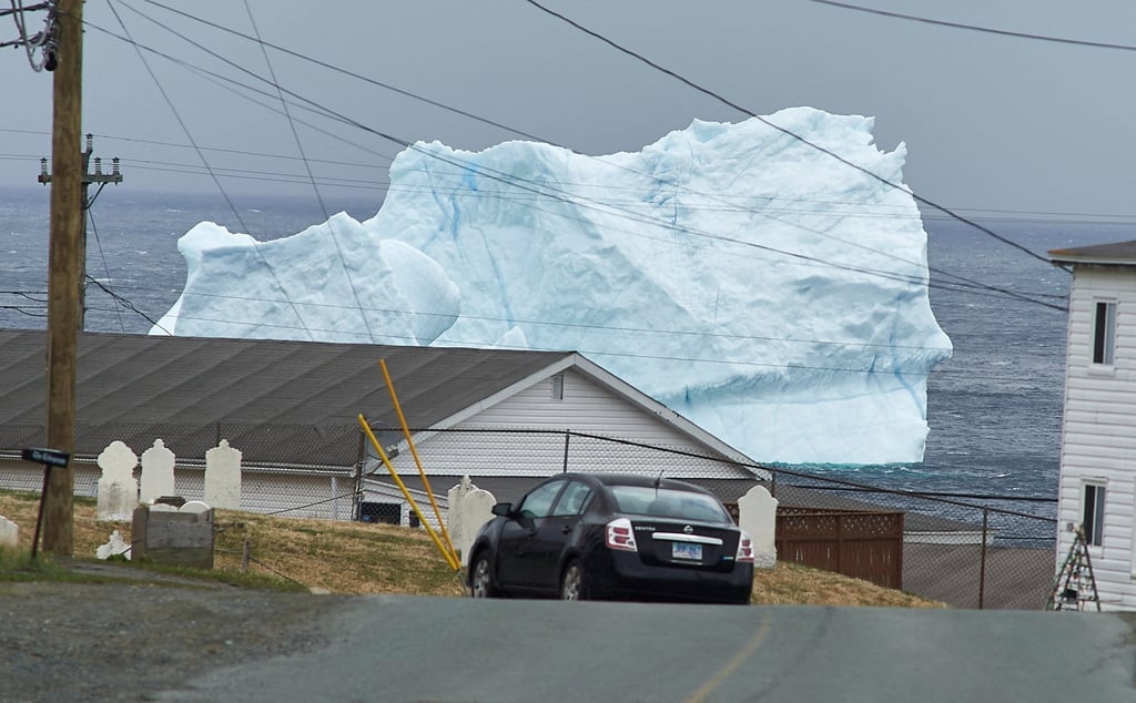 A large iceberg grounded in the harbour in Pouch Cove, Newfoundland this month. Photo: Reuters