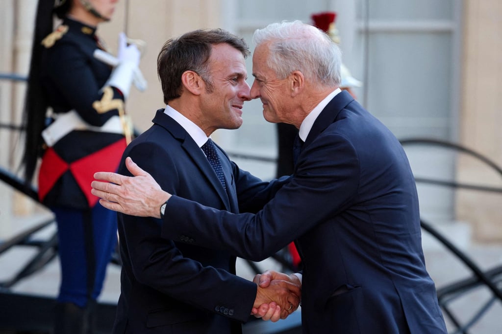 French President Emmanuel Macron (left) welcomes Norwegian ⁠Prime Minister Jonas Gahr Stoere at the Elysee Presidential Palace in Paris on Wednesday. Photo: AFP