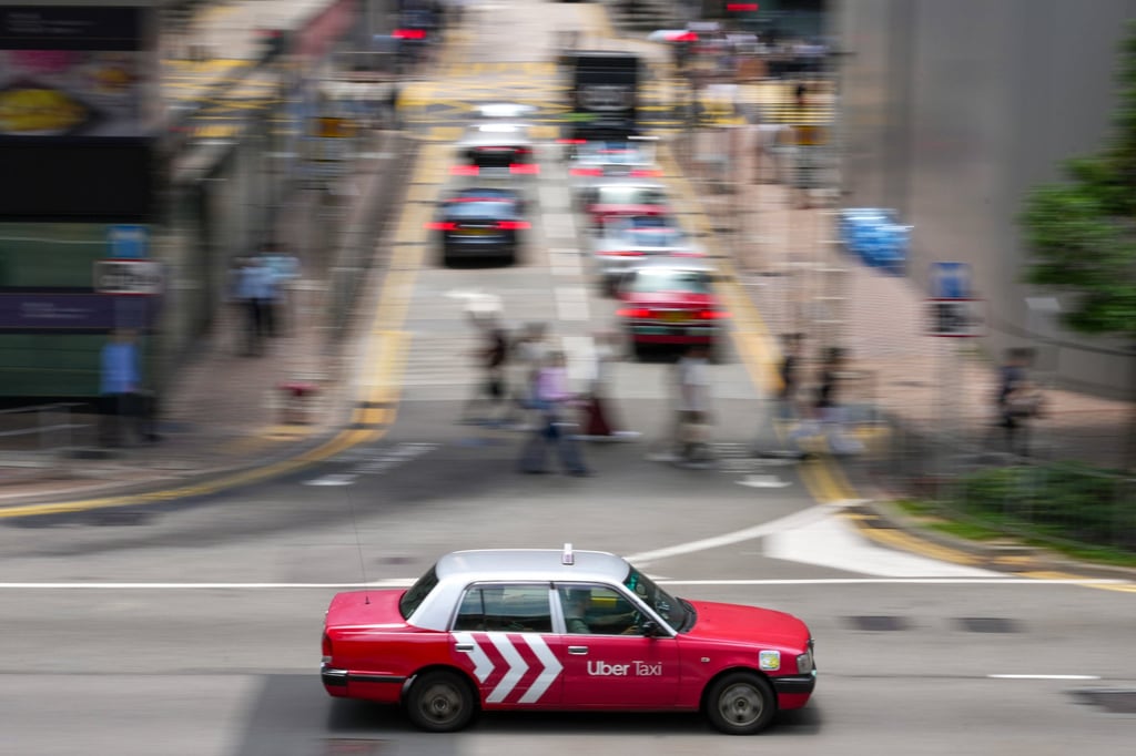 Michael Tien estimates that about 11,000 of the 16,000 urban taxis are already on the Uber platform. Photo: Karma Lo