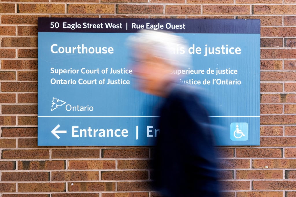 A man walks outside the Superior Court of Justice in Ontario, Canada, on Friday. Photo: Reuters