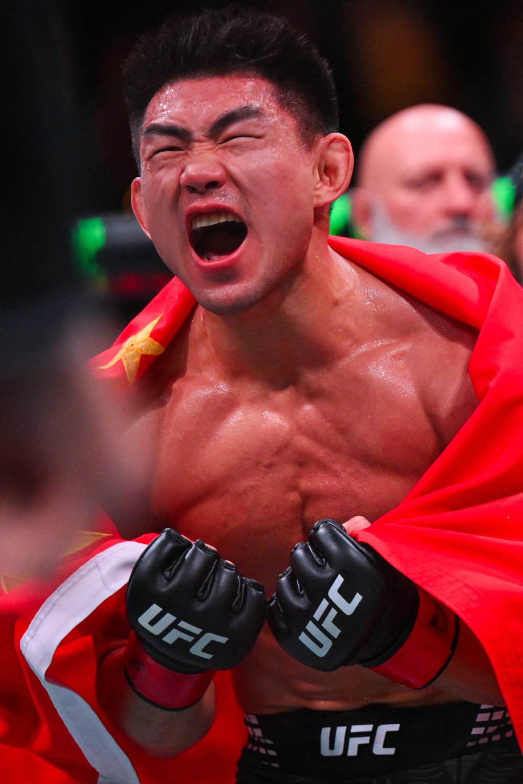 Song Yadong celebrates winning the bantamweight bout against Deiveson Figueiredo. Photo: Xinhua Song Yadong celebrates winning the bantamweight bout against Deiveson Figueiredo. Photo: Xinhua