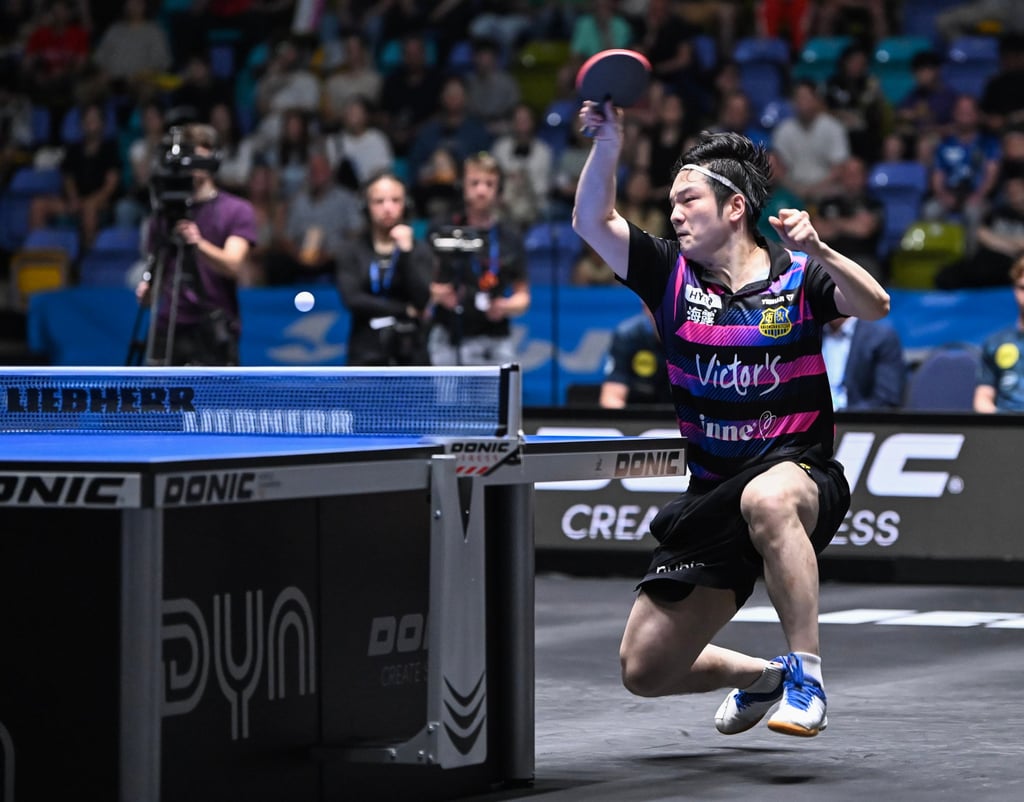 Fan Zhendong hits a return in his win over Qiu Dang of Borussia Dusseldorf. Photo: Xinhua Fan Zhendong hits a return in his win over Qiu Dang of Borussia Dusseldorf. Photo: Xinhua