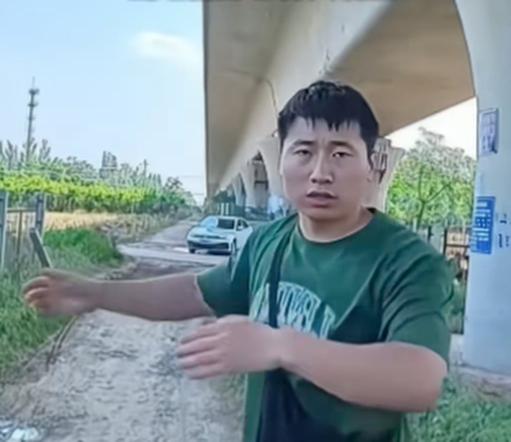 Chutou’s owner Guo, above, explains to the media what happened to his dog. Photo: Douyin