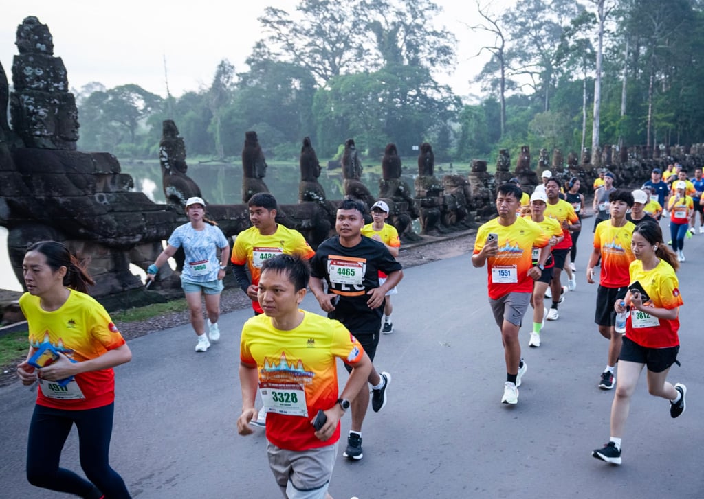 The scenic route of the Angkor Empire Marathon is proving a big drawcard for serious runners and tourists from far and wide. Photo: Cambodia Tourism Board The scenic route of the Angkor Empire Marathon is proving a big drawcard for serious runners and tourists from far and wide. Photo: Cambodia Tourism Board