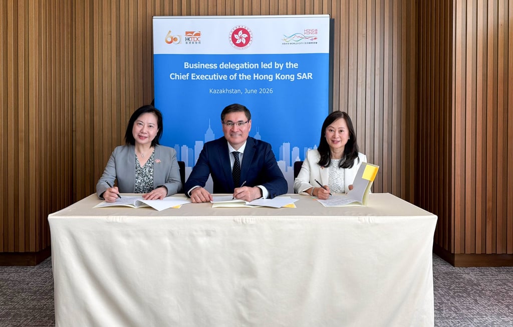 Khabar Agency chairman Kemelbek Oishybayev flanked by Crystal Cheung and Tammy Tam. Hong Kong media groups say the visit to Kazakhstan will foster deeper collaboration with Central Asia. Photo: Jeffie Lam. Khabar Agency chairman Kemelbek Oishybayev flanked by Crystal Cheung and Tammy Tam. Hong Kong media groups say the visit to Kazakhstan will foster deeper collaboration with Central Asia. Photo: Jeffie Lam.