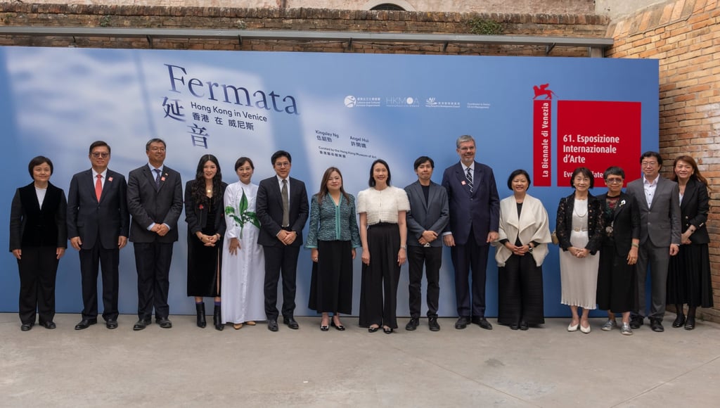 Hong Kong’s Secretary for Culture, Sports and Tourism Rosanna Law (ninth right), Kingsley Ng (seventh right), Angel Hui (fourth left), Hong Kong Arts Development Council chairman Kenneth Fok (sixth left), Director of Leisure and Cultural Services Manda Chan (eighth right) and Maria Mok (fifth left) with guests at the opening ceremony of “Fermata: Hong Kong in Venice”.